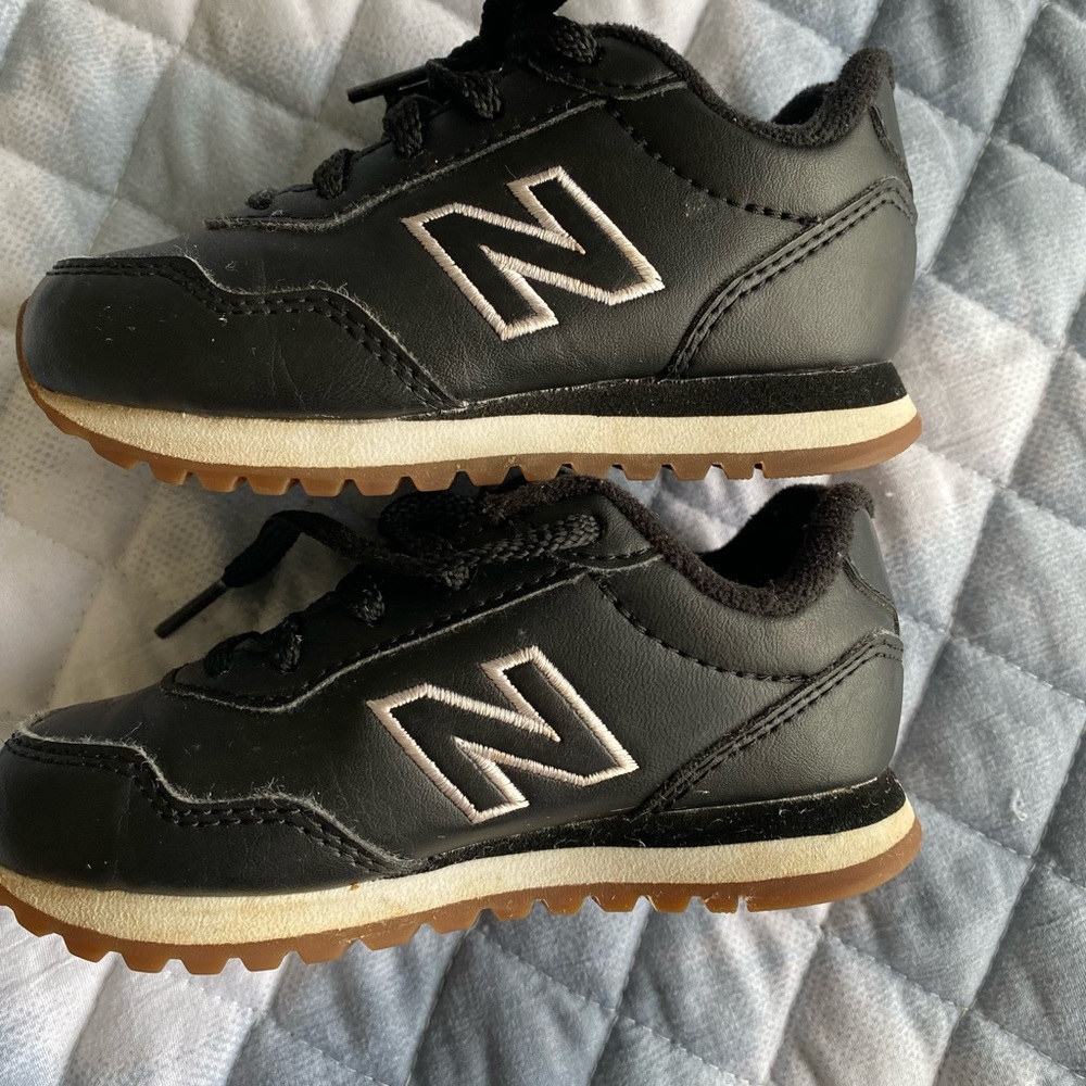 Black Leather style New Balance sneakers